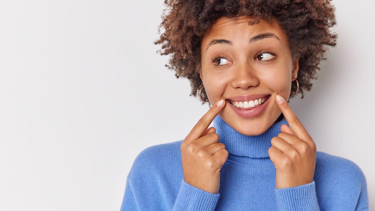 Client with a clean, authentic, healthy white smile